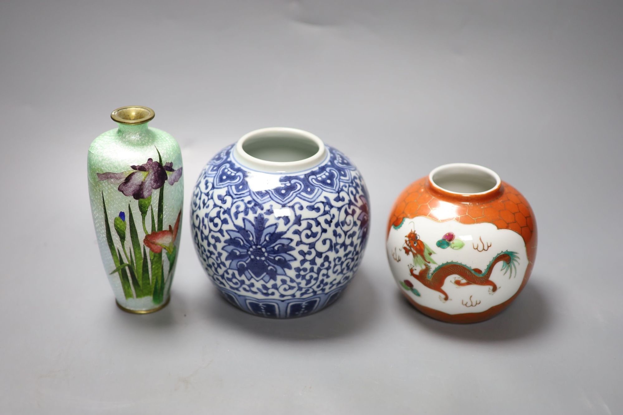 A group of Chinese and Japanese ceramics and three cloisonne enamel vases